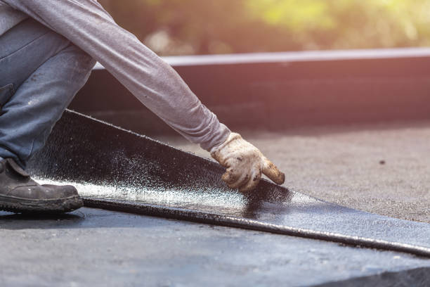 Professional Basement Waterproofing technician working in Chelsea, MI
